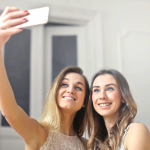 Beautiful girls taking selfie - Plastic surgery