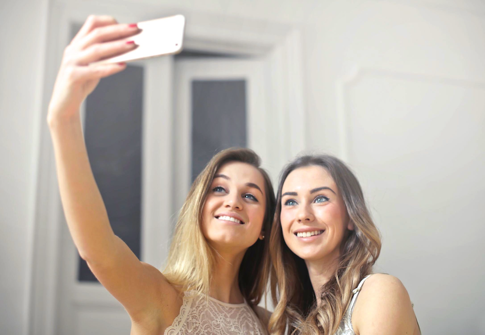 Beautiful girls taking selfie - Plastic surgery
