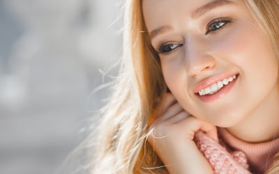 Close up portrait of young beautiful woman outdoors
