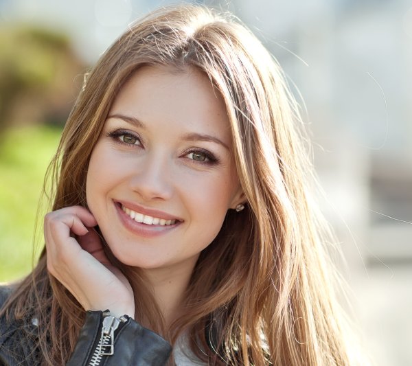 Portrait Of Young Smiling Beautiful Woman